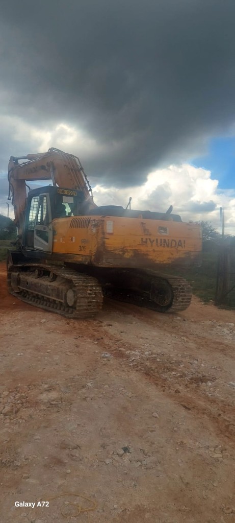 Excavator in rough terrain
